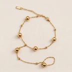Gold Beaded Hand Chain Bracelet
