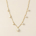 Gold Dangling Pearl Drop Necklace
