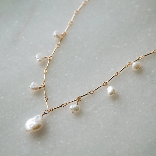 Gold Dangling Pearl Drop Necklace