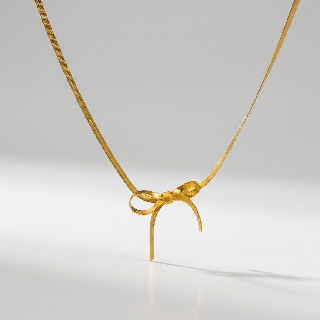 Gold Snake Chain Bow Necklace